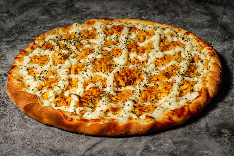 BBQ Chicken thin crust pizza with tangy barbecue sauce
